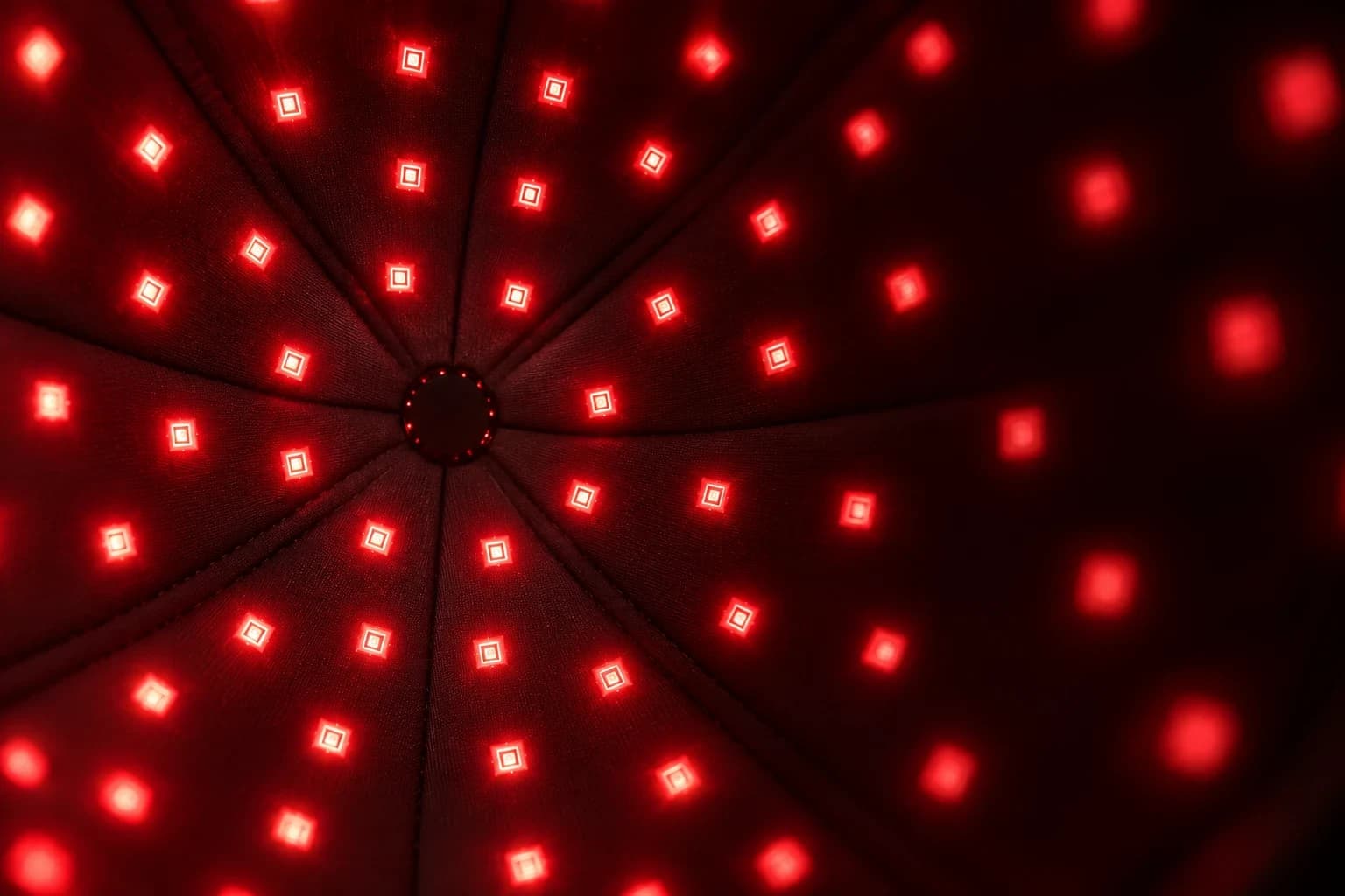 Close-up of Theracap's LED array glowing red